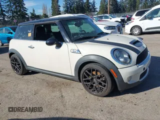 2009 MINI Hardtop S with VIN WMWMF73519TT99560, listed as a IAAI auction lot 41691939 with Not Provided miles and . Bid and sale history available at DreamBid. Image 1.
