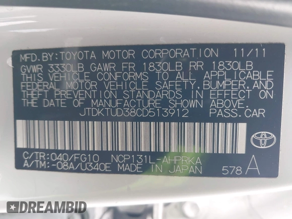 2012 Toyota Yaris L with VIN JTDKTUD38CD513912, listed as a IAAI auction lot 42131567 with 133,664 mi miles. Bid and sale history available at carsss.com. Image 9.
