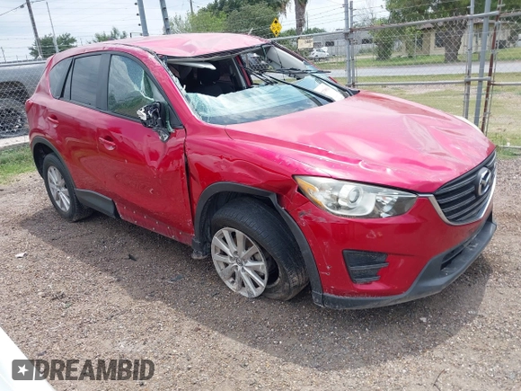 2016 Mazda CX-5 Sport with VIN JM3KE2BYXG0668401, listed as a IAAI auction lot 42370910 with Not provided miles and . Bid and sale history available at DreamBid. Image 1.