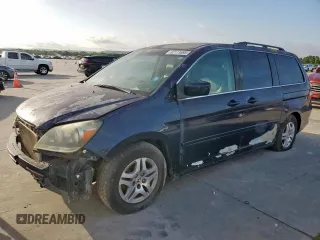 2006 Honda Odyssey EX-L with VIN 5FNRL38746B001051, listed as a Copart auction lot 62111695 with 296,117 mi miles and Salvage title. Bid and sale history available at DreamBid. Image 1.