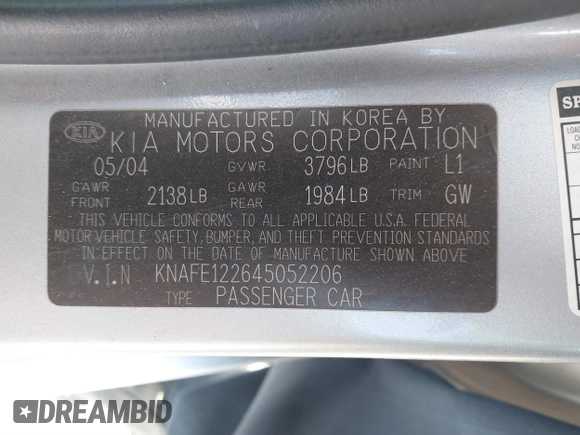 2004 Kia Spectra LX with VIN KNAFE122645052206, listed as a IAAI auction lot 41767864 with 63,866 mi miles. Bid and sale history available at carsss.com. Image 9.