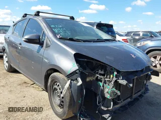 2015 Toyota Prius One z VIN JTDKDTB38F1088014, wystawiony jako IAAI lot #42227740 z przebiegiem 198 950 mil mil oraz . Historia ofert i sprzedaży dostępna na DreamBid. Obrazek 1.