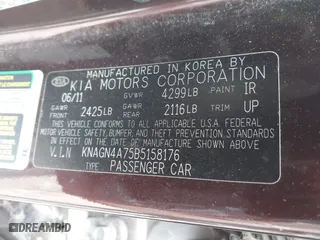 2011 Kia Optima EX with VIN KNAGN4A75B5158176, listed as a IAAI auction lot 41553536 with 140,785 mi miles. Bid and sale history available at carsss.com. Image 9.