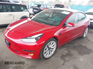 2022 Tesla Model 3 with VIN 5YJ3E1EA8NF177409, listed as a IAAI auction lot 41740718 with 25,557 mi miles. Bid and sale history available at carsss.com. Image 2.