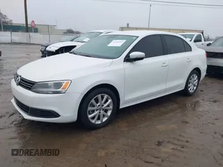 2014 Volkswagen Jetta Sedan SE w/Connectivity with VIN 3VWD07AJ7EM330558, listed as a IAAI auction lot 41353302 with 128,382 mi miles. Bid and sale history available at carsss.com. Image 2.