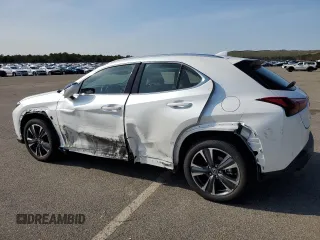 2025 Lexus UX with VIN JTHUCJDH6S2007491, listed as a Copart auction lot 52997175 with 1,042 mi miles and Salvage Title. Bid and sale history available at carsss.com. Image 2.