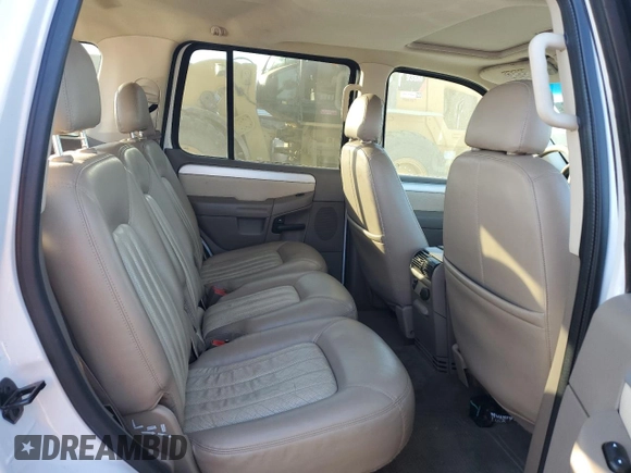 2002 Mercury Mountaineer z VIN 4M2ZU86E92ZJ36990, wystawiony jako Copart lot #88510425 z przebiegiem 163 872 mil mil oraz Szkody całkowita. Historia ofert i sprzedaży dostępna na DreamBid. Obrazek 11.