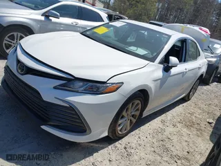 2024 Toyota Camry LE with VIN 4T1C11AK3RU199577, listed as a IAAI auction lot 41846931 with 49,000 mi miles. Bid and sale history available at carsss.com. Image 2.