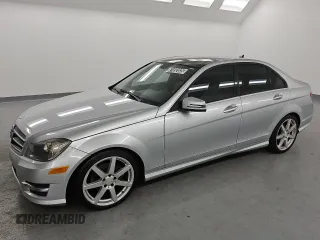 2014 Mercedes-Benz C 250 Sport with VIN WDDGF4HB4EG242305, listed as a Copart auction lot 61692835 with 158,590 mi miles and Clean title. Bid and sale history available at DreamBid. Image 1.