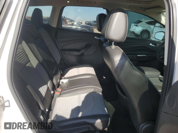 2017 Ford Escape SE z VIN 1FMCU9G97HUC26806, wystawiony jako Copart lot #65464674 z przebiegiem 93 023 mil mil oraz Szkoda całkowita • Salvage title. Historia ofert i sprzedaży dostępna na DreamBid. Obrazek 10.