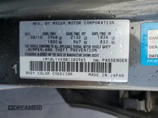 2011 Mazda 3 i Touring with VIN JM1BL1VG9B1380965, listed as a Copart auction lot 55554325 with 74,025 mi miles and Salvage Title. Bid and sale history available at DreamBid. Image 12.