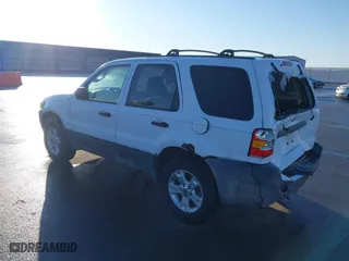 2005 Ford Escape XLT with VIN 1FMYU931X5KA84738, listed as a IAAI auction lot 41663564 with 140,903 mi miles. Bid and sale history available at carsss.com. Image 3.