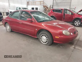 1998 Ford Taurus SE Comfort z VIN 1FAFP53S4WA168846, wystawiony jako IAAI lot #42482348 z przebiegiem 140 194 mil mil oraz . Historia ofert i sprzedaży dostępna na DreamBid. Obrazek 1.