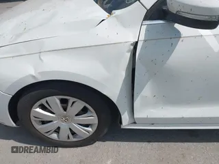 2013 Volkswagen Jetta SE z VIN 3VWDX7AJXDM297095, wystawiony jako IAAI lot #42664873 z przebiegiem 69 061 mil mil oraz . Historia ofert i sprzedaży dostępna na DreamBid. Obrazek 12.