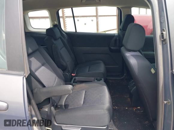 2009 Mazda 5 Touring with VIN JM1CR29LX90333914, listed as a IAAI auction lot 42101304 with 129,470 mi miles. Bid and sale history available at carsss.com. Image 8.