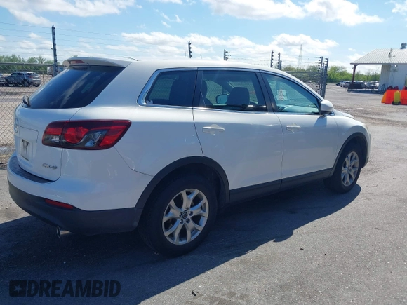 2015 Mazda CX-9 Sport with VIN JM3TB2BV3F0455632, listed as a IAAI auction lot 41881026 with 102,201 mi miles and . Bid and sale history available at carsss.com. Image 13.