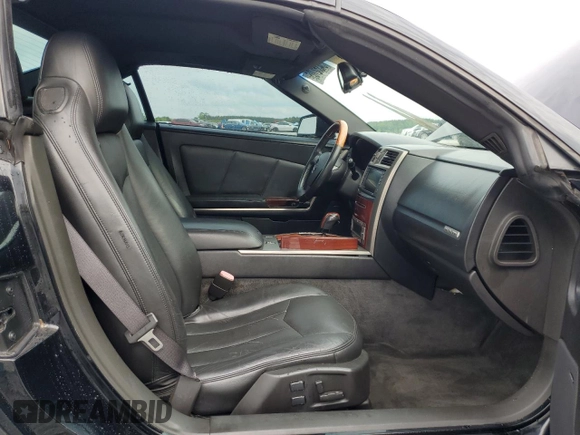 2006 Cadillac XLR z VIN 1G6YV36A265600782, wystawiony jako Copart lot #54352705 z przebiegiem 94 678 mil mil oraz Szkody całkowita. Historia ofert i sprzedaży dostępna na DreamBid. Obrazek 10.