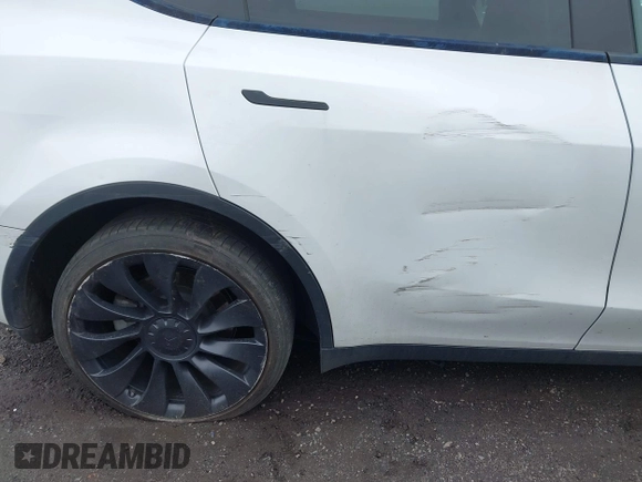 2022 Tesla Model Y Long Range z VIN 7SAYGDEE7NF389788, wystawiony jako IAAI lot #42014111 z przebiegiem 37 606 mil mil oraz . Historia ofert i sprzedaży dostępna na DreamBid. Obrazek 19.