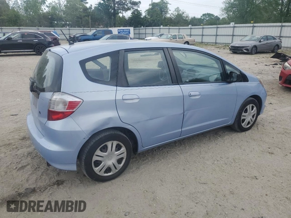 2009 Honda Fit with VIN JHMGE88209S040292, listed as a Copart auction lot 53551595 with 188,494 mi miles and Clean Title. Bid and sale history available at carsss.com. Image 3.