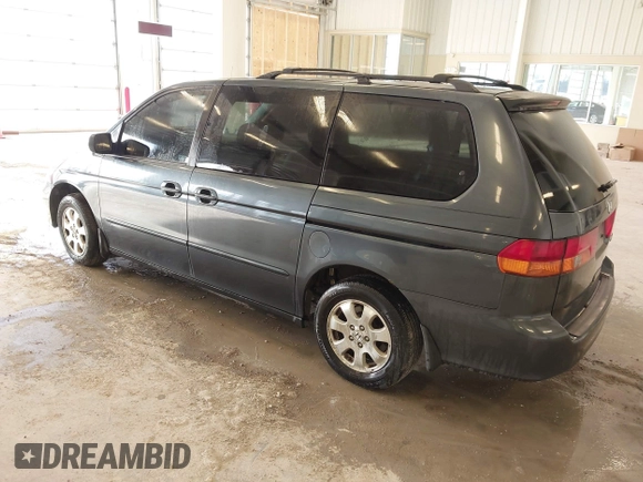 2004 Honda Odyssey EX z VIN 5FNRL18674B050429, wystawiony jako IAAI lot #41655622 z przebiegiem 257 656 mil mil oraz . Historia ofert i sprzedaży dostępna na DreamBid. Obrazek 3.
