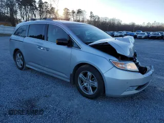 2012 Honda Odyssey Touring with VIN 5FNRL5H9XCB027758, listed as a Copart auction lot 86058504 with 164,860 mi miles and Salvage Title. Bid and sale history available at DreamBid. Image 4.