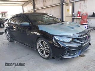 2018 Honda Civic Si z VIN 2HGFC1E51JH703830, wystawiony jako IAAI lot #40372864 z przebiegiem 41 389 mil mil oraz . Historia ofert i sprzedaży dostępna na DreamBid. Obrazek 1.