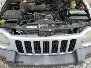 2004 Jeep Liberty Sport with VIN 1J4GL48KX4W195315, listed as a Copart auction lot 51064875 with 260,432 mi miles and Salvage Title. Bid and sale history available at carsss.com. Image 12.