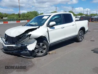 2019 Honda Ridgeline RTL with VIN 5FPYK2F52KB004624, listed as a IAAI auction lot 41789190 with 51,834 mi miles and . Bid and sale history available at DreamBid. Image 2.