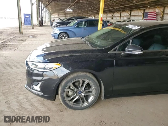 2020 Ford Fusion Titanium with VIN 3FA6P0RU7LR100411, listed as a Copart auction lot 56215615 with 108,457 mi miles and Salvage title. Bid and sale history available at DreamBid. Image 13.