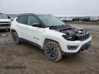 2021 Jeep Compass Trailhawk with VIN 3C4NJDDB5MT590369, listed as a Copart auction lot 46107685 with 67,857 mi miles and Salvage title. Bid and sale history available at DreamBid. Image 4.