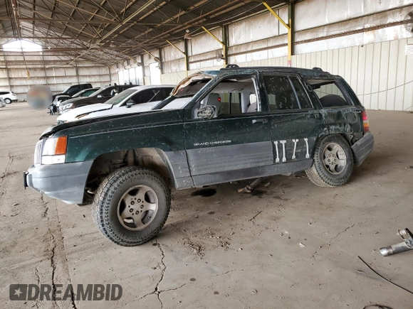 1996 Jeep Grand Cherokee Laredo with VIN 1J4GZ58S6TC304597, listed as a Copart auction lot 52962545 with Not provided miles and Salvage title. Bid and sale history available at DreamBid. Image 1.