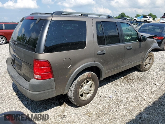 2003 Ford Explorer XLS with VIN 1FMZU72K43UB12036, listed as a Copart auction lot 61124985 with 210,901 mi miles and Salvage title. Bid and sale history available at DreamBid. Image 3.