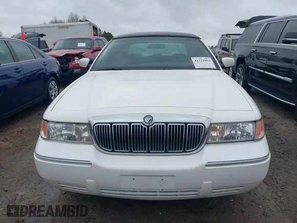 1999 Mercury Grand Marquis GS z VIN 2MEFM74W9XX622371, wystawiony jako IAAI lot #41721054 z przebiegiem 131 724 mil mil oraz . Historia ofert i sprzedaży dostępna na DreamBid. Obrazek 12.