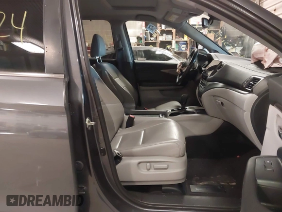 2019 Honda Pilot EX-L with VIN 5FNYF6H50KB035548, listed as a IAAI auction lot 42011724 with 105,195 mi miles and . Bid and sale history available at DreamBid. Image 5.