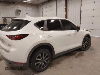 2018 Mazda CX-5 S Premium with VIN JM3KFBDM1J1412088, listed as a IAAI auction lot 41497431 with 65,532 mi miles and . Bid and sale history available at DreamBid. Image 4.
