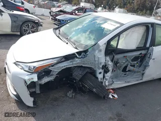 2021 Toyota Prius L Eco with VIN JTDKAMFUXM3144845, listed as a IAAI auction lot 41358306 with 1 mi miles. Bid and sale history available at carsss.com. Image 6.