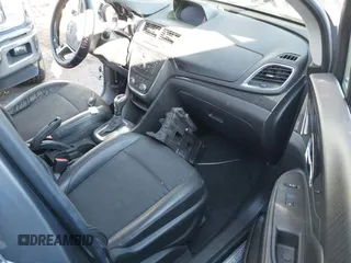 2015 Buick Encore with VIN KL4CJASB3FB168155, listed as a IAAI auction lot 41861563 with 57,574 mi miles. Bid and sale history available at carsss.com. Image 5.