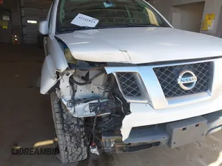 2014 Nissan Frontier SV with VIN 1N6AD0EV4EN736220, listed as a IAAI auction lot 41241823 with 91,789 mi miles and . Bid and sale history available at DreamBid. Image 6.