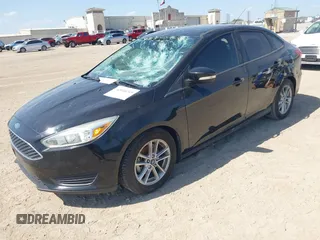 2016 Ford Focus SE with VIN 1FADP3F28GL349817, listed as a IAAI auction lot 42016215 with 68,816 mi miles and . Bid and sale history available at DreamBid. Image 2.