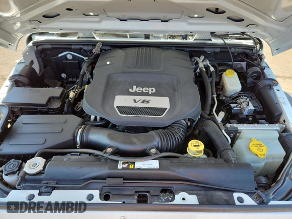 2015 Jeep Wrangler Unlimited Freedom with VIN 1C4HJWDGXFL755528, listed as a Copart auction lot 64927525 with 111,096 mi miles and Salvage title. Bid and sale history available at DreamBid. Image 11.