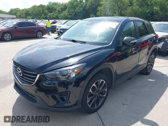 2016 Mazda CX-5 Grand Touring z VIN JM3KE2DY2G0765444, wystawiony jako IAAI lot #42527577 z przebiegiem 162 871 mil mil oraz . Historia ofert i sprzedaży dostępna na DreamBid. Obrazek 17.