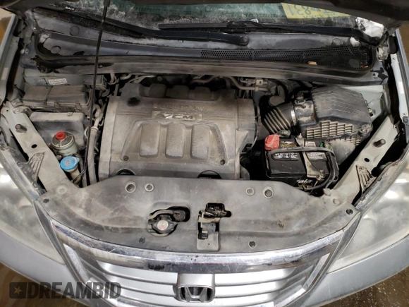 2008 Honda Odyssey Touring z VIN 5FNRL38918B104500, wystawiony jako Copart lot #47816145 z przebiegiem 262 179 mil mil oraz Szkoda całkowita • Salvage title. Historia ofert i sprzedaży dostępna na DreamBid. Obrazek 12.