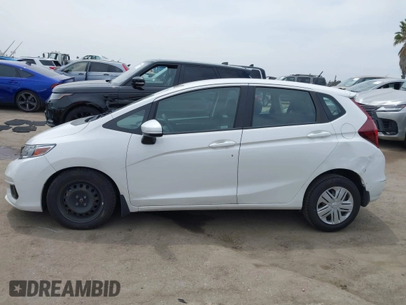 2020 Honda Fit LX with VIN 3HGGK5H44LM718313, listed as a IAAI auction lot 42358302 with 63,964 mi miles and . Bid and sale history available at DreamBid. Image 14.
