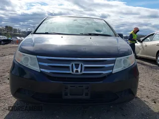2011 Honda Odyssey EX with VIN 5FNRL5H4XBB011918, listed as a IAAI auction lot 42056043 with 201,821 mi miles and . Bid and sale history available at carsss.com. Image 12.