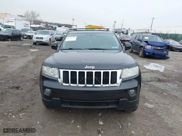 2011 Jeep Grand Cherokee Laredo with VIN 1J4RR4GGXBC511475, listed as a IAAI auction lot 41554620 with 164,361 mi miles. Bid and sale history available at carsss.com. Image 12.