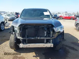 2022 Toyota Tacoma SR with VIN 3TYRX5GN3NT066696, listed as a IAAI auction lot 42514462 with 35,687 mi miles and . Bid and sale history available at DreamBid. Image 13.