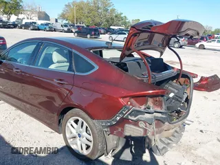 2016 Ford Fusion Titanium Hybrid with VIN 3FA6P0RU8GR127140, listed as a IAAI auction lot 41750405 with 110,861 mi miles. Bid and sale history available at carsss.com. Image 18.