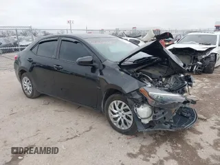 2019 Toyota Corolla L with VIN 5YFBURHE9KP894770, listed as a IAAI auction lot 41565626 with 57,859 mi miles. Bid and sale history available at carsss.com. Image 1.
