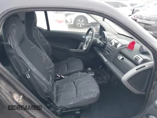 2008 Smart fortwo Pure z VIN WMEEJ31X28K206311, wystawiony jako IAAI lot #42269686 z przebiegiem 48 601 mil mil oraz . Historia ofert i sprzedaży dostępna na DreamBid. Obrazek 5.
