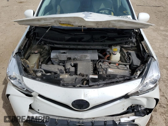 2017 Toyota Prius Two z VIN JTDZN3EU6HJ074065, wystawiony jako Copart lot #55074825 z przebiegiem 114 071 mil mil oraz Szkoda całkowita • Salvage title. Historia ofert i sprzedaży dostępna na DreamBid. Obrazek 11.